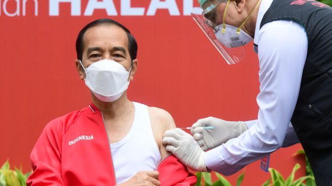 Resmi! Jokowi Terbitkan Aturan Denda dan Pidana Warga Penolak Vaksin Corona